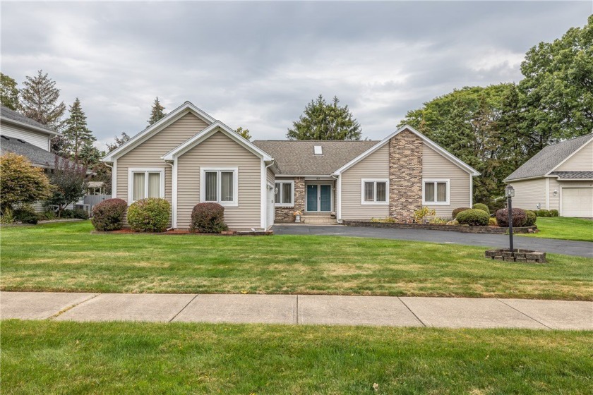 Tucked Away on a Cui-De-Sac, This Charming Ranch Hold Many - Beach Home for sale in Rochester, New York on Beachhouse.com