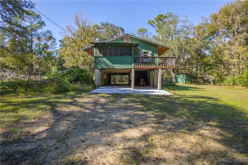 Step into the charm of Old Florida with this unique 2-bedroom - Beach Home for sale in Gulf Hammock, Florida on Beachhouse.com