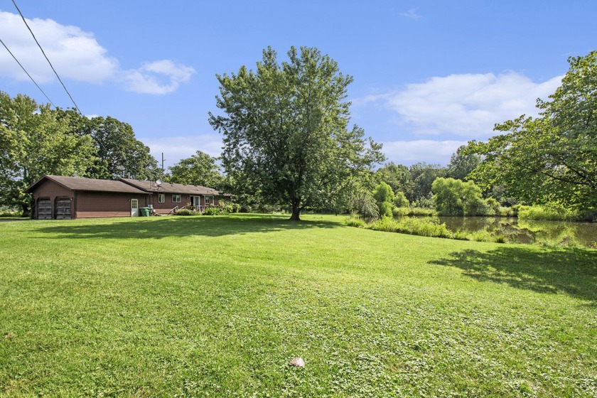 A peaceful 10-acre corner lot with a pond tucked away in the - Beach Home for sale in Three Oaks, Michigan on Beachhouse.com