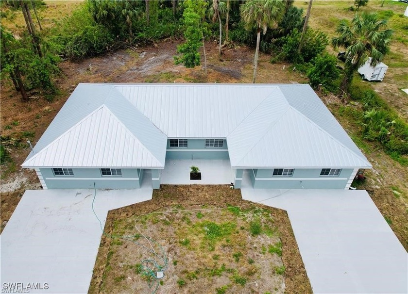 Welcome to this Buckingham duplex, a beautifully remodeled - Beach Home for sale in Fort Myers, Florida on Beachhouse.com