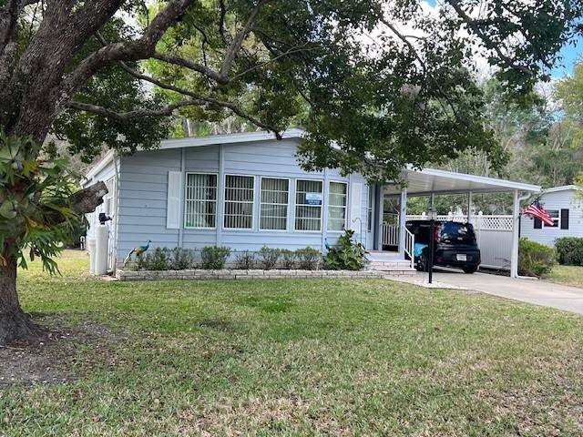 Welcome to this spacious and well-maintained manufactured home - Beach Home for sale in Spring Hill, Florida on Beachhouse.com