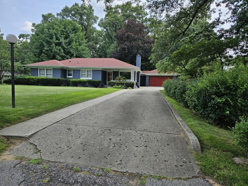 Beautiful  3 bedroom  Ranch on .580 acre offers a Park like - Beach Home for sale in Portage, Indiana on Beachhouse.com