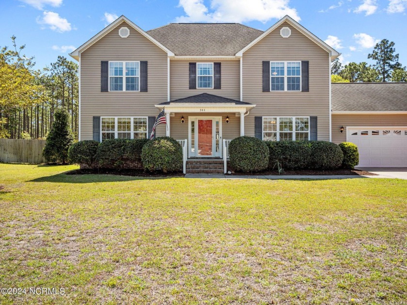 This stunning 4 bedroom, 2.5 bathroom home sits on a quiet cul - Beach Home for sale in Cape Carteret, North Carolina on Beachhouse.com