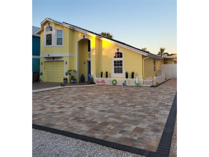 This home was damaged from flooding during the storm, but the - Beach Home for sale in Indian Rocks Beach, Florida on Beachhouse.com