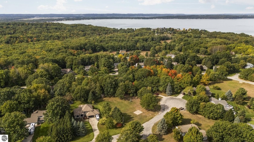 Set within the sought-after Wellington Farms subdivision, this - Beach Lot for sale in Williamsburg, Michigan on Beachhouse.com