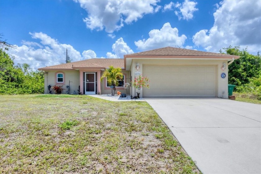 Major Price Drop of $25K! Charming Single-Family Home in Prime - Beach Home for sale in Port Charlotte, Florida on Beachhouse.com