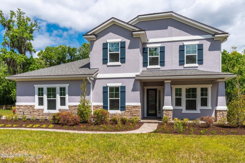 Located on Doctor's Lake, and situated in a 6-home gated - Beach Home for sale in Fleming Island, Florida on Beachhouse.com