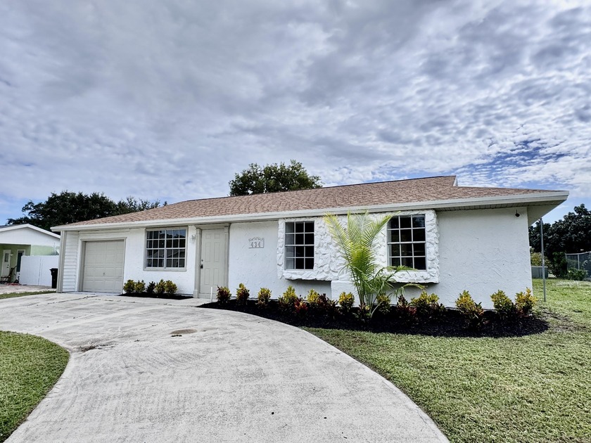 Welcome to 434 Electra, a beautifully updated 4-bedroom, 2-bath - Beach Home for sale in Port Saint Lucie, Florida on Beachhouse.com
