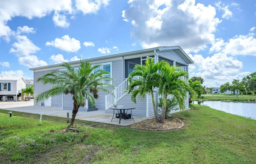 This move-in-ready 2-bed, 2-bath home, nestled on a serene lake - Beach Home for sale in Fort Myers Beach, Florida on Beachhouse.com