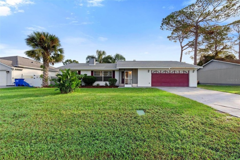 Welcome to this charming 3-bedroom, 2-bathroom home with an - Beach Home for sale in Edgewater, Florida on Beachhouse.com