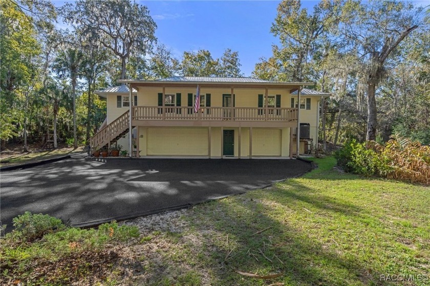 RIVERFRONT... 150 FT offering all the privacy, serenity, and - Beach Home for sale in Inglis, Florida on Beachhouse.com