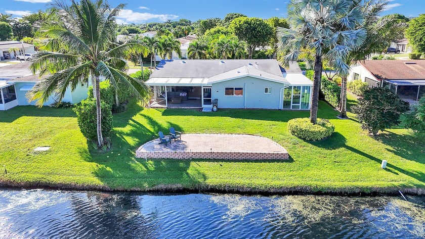 Experience lakeside living at its finest in this beautifully - Beach Home for sale in Delray Beach, Florida on Beachhouse.com