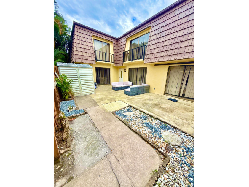 Charm meets convenience in this delightful  abode! Step into a - Beach Townhome/Townhouse for sale in Palm Springs, Florida on Beachhouse.com