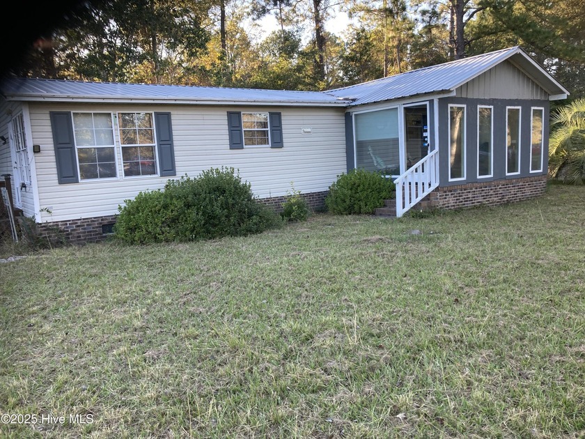 Come see this lovely place at the beach. Still close enough to - Beach Home for sale in Shallotte, North Carolina on Beachhouse.com