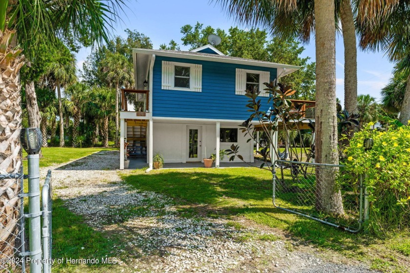 Post card views and island living abound when you make this 2/1 - Beach Home for sale in Weeki Wachee, Florida on Beachhouse.com