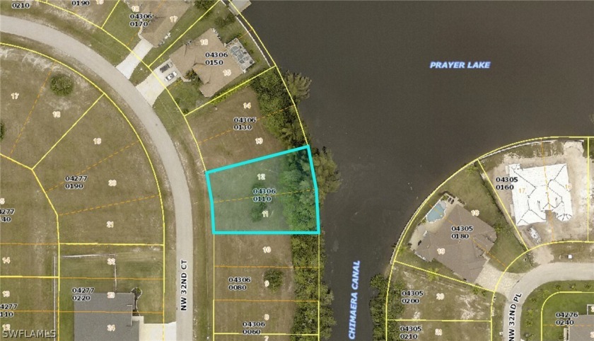 Amazing location with beautiful LAKE VIEWS on Prayer Lake.  This - Beach Lot for sale in Cape Coral, Florida on Beachhouse.com