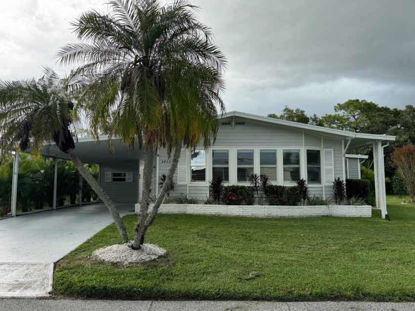 THIS HOME IS ON LEASED LAND WITH AN APPROXIMATE MONTHLY LOT - Beach Home for sale in Sarasota, Florida on Beachhouse.com