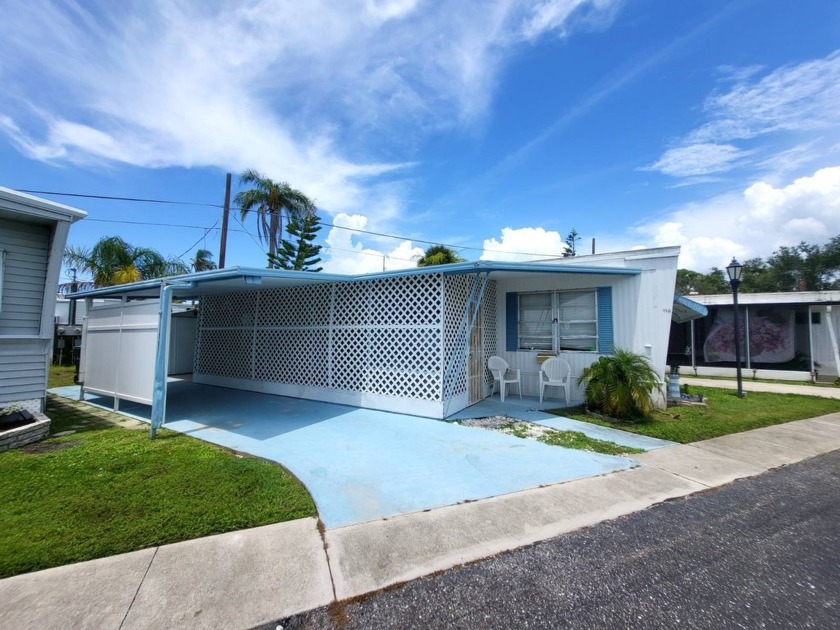 PET FRIENDLY AND JUST 6 MILES TO SIESTA KEY! Now you can afford - Beach Home for sale in Sarasota, Florida on Beachhouse.com