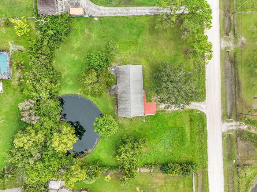 ABSOLUTELY GORGEOUS WATERFRONT SINGLE-FAMILY HOME | BREATHTAKING - Beach Home for sale in West Palm Beach, Florida on Beachhouse.com