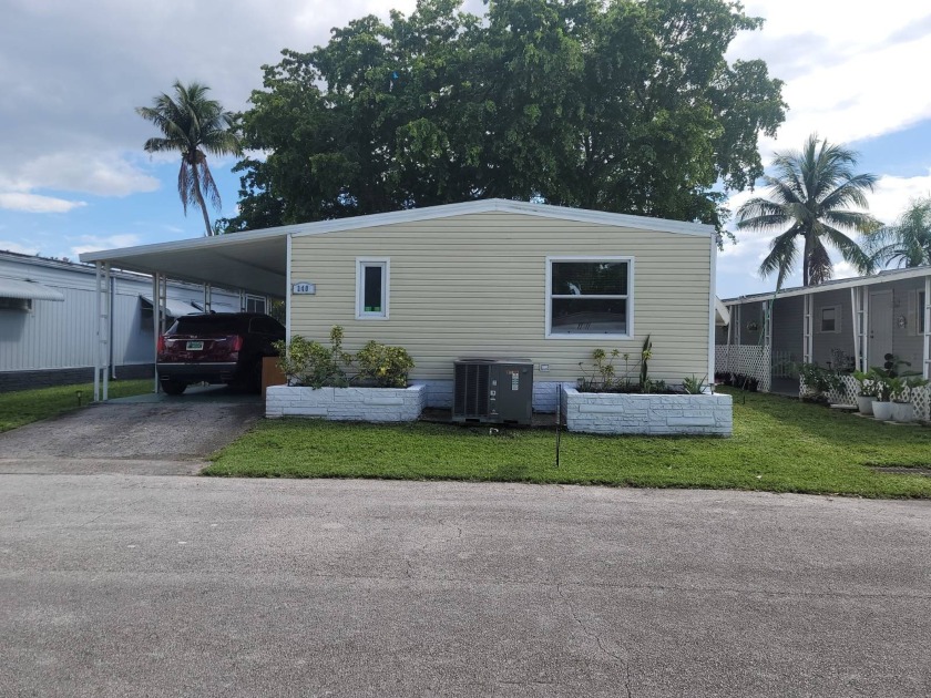 TREAT yourself to a Glass of your favorite beverage, sit out on - Beach Home for sale in Davie, Florida on Beachhouse.com