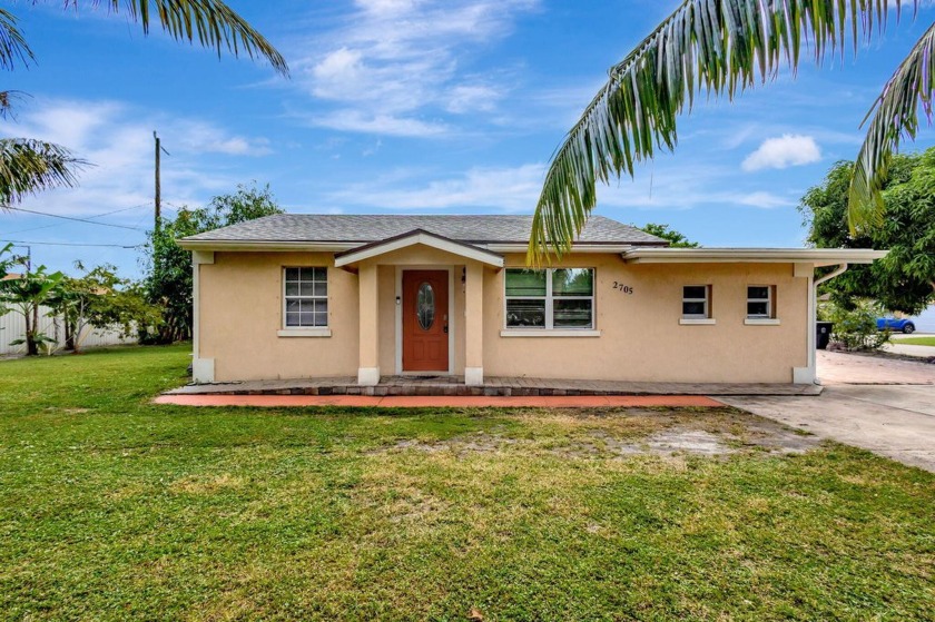 Impressive Corner Lot Home in Lake Worth - Updated and Ready to - Beach Home for sale in Lake Worth, Florida on Beachhouse.com