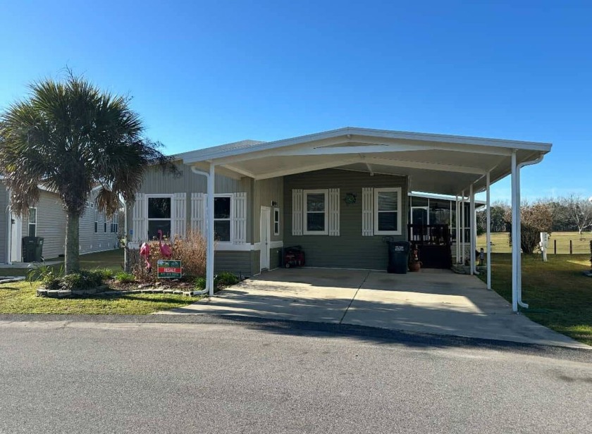Located in the Foley Grove, a charming land-leased 55+ - Beach Home for sale in Foley, Alabama on Beachhouse.com
