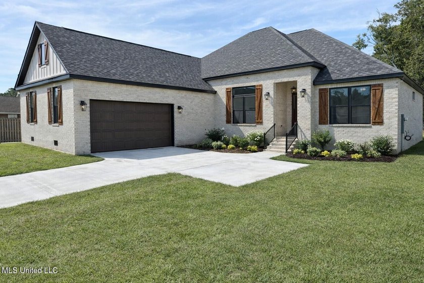 RE-INTRODUCED WITH A NEW PRICE! Brand New Custom Home -Dual - Beach Home for sale in Long Beach, Mississippi on Beachhouse.com