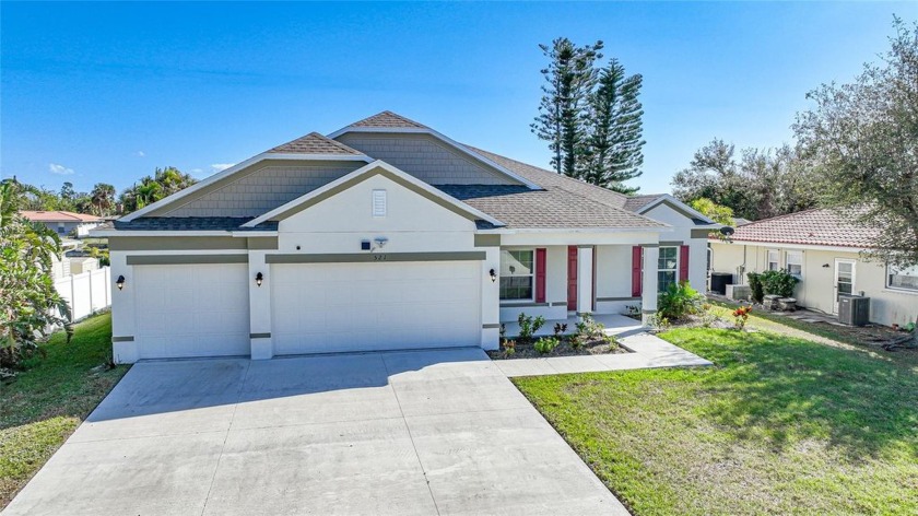 Gorgeous WATERFRONT 4 bedroom plus Den, 3 bathrooms , 3 car - Beach Home for sale in Port Charlotte, Florida on Beachhouse.com