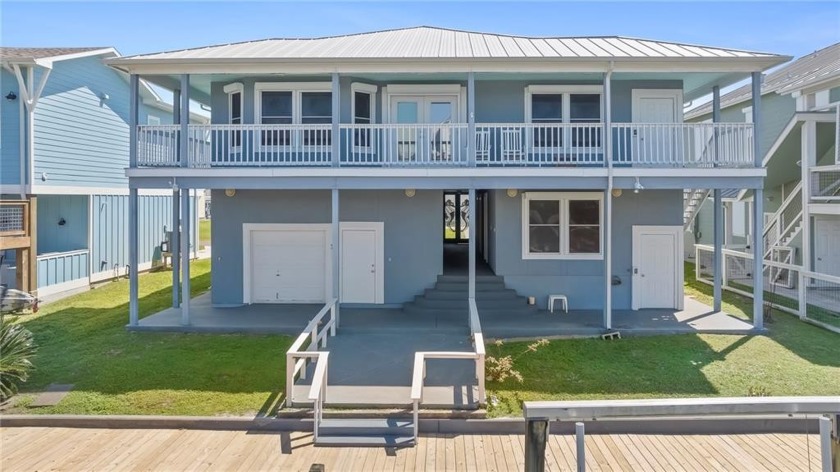 This unique waterfront home boasts an oversized 4-car garage - Beach Home for sale in Aransas Pass, Texas on Beachhouse.com