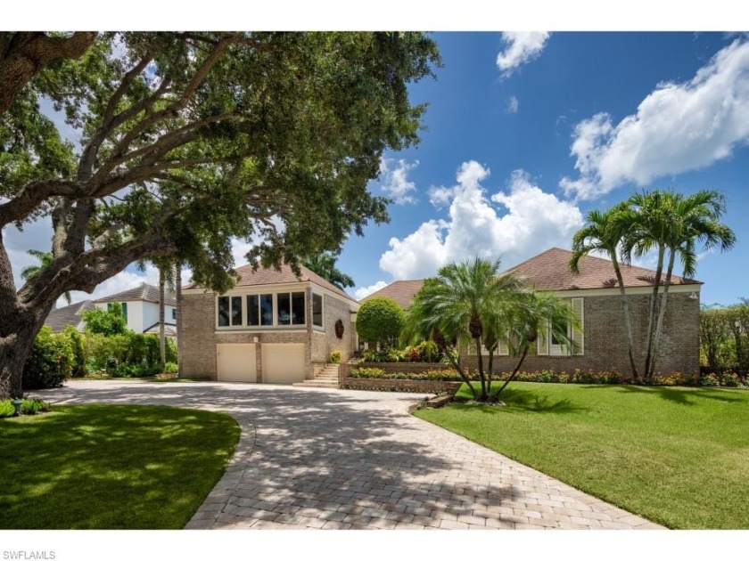 A beautiful setting on Half Moon Lake in the exclusive Port - Beach Home for sale in Naples, Florida on Beachhouse.com