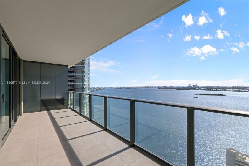 This stunning residence invites you through a private foyer into - Beach Condo for sale in Miami, Florida on Beachhouse.com