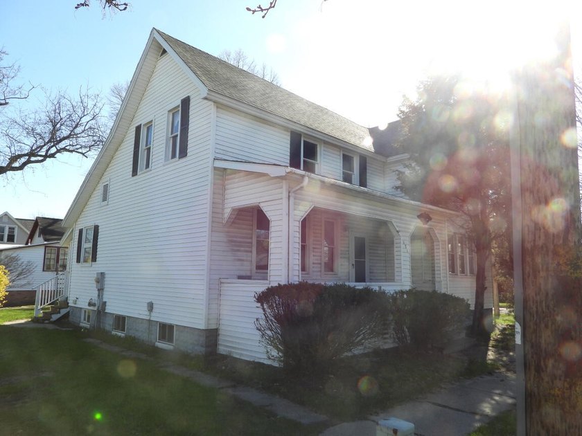 2 STORY HOME WITH 4 BEDROOM, 2 BATH AND FULL BASEMENT. HOUSE IS - Beach Home for sale in Manistee, Michigan on Beachhouse.com