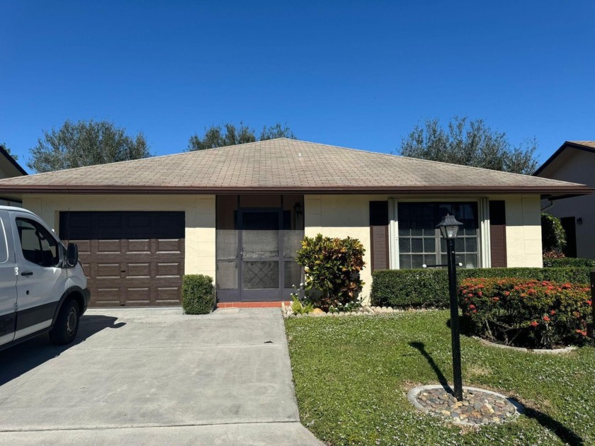 Charming home located in a serene Greenacres neighborhood. This - Beach Home for sale in Greenacres, Florida on Beachhouse.com