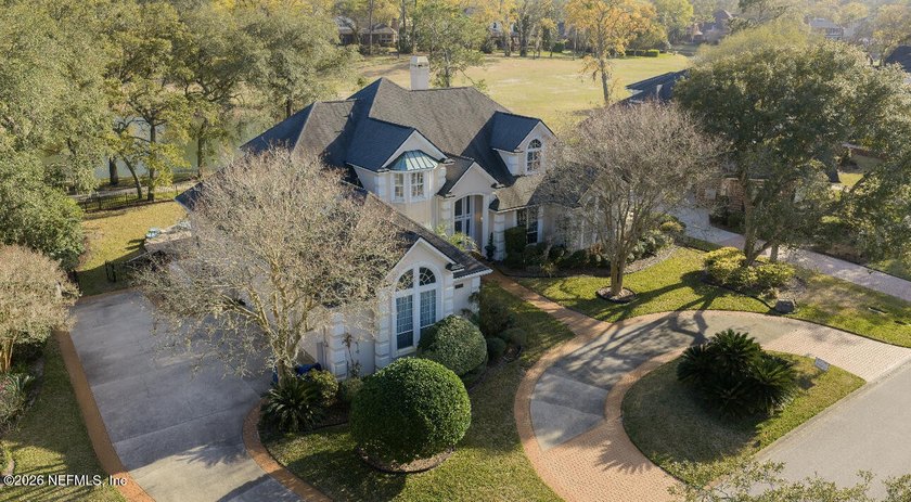 Experience luxury living in Hidden Hills Country Club, a gated - Beach Home for sale in Jacksonville, Florida on Beachhouse.com