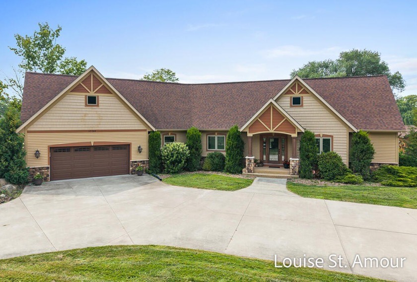 Spacious, waterfront home on 300 ft of Smiths Bayou, a gateway - Beach Home for sale in Spring Lake, Michigan on Beachhouse.com