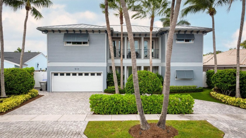 This custom-designed and builder-crafted waterfront masterpiece - Beach Home for sale in Pompano Beach, Florida on Beachhouse.com