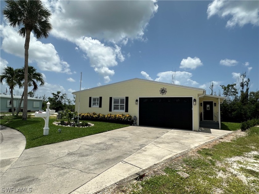 This triple-wide Bayside Estates home at the end of the Peppard - Beach Home for sale in Fort Myers Beach, Florida on Beachhouse.com