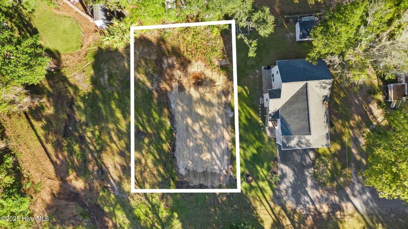 Discover the perfect canvas for your dream home in the tranquil - Beach Lot for sale in Shallotte, North Carolina on Beachhouse.com