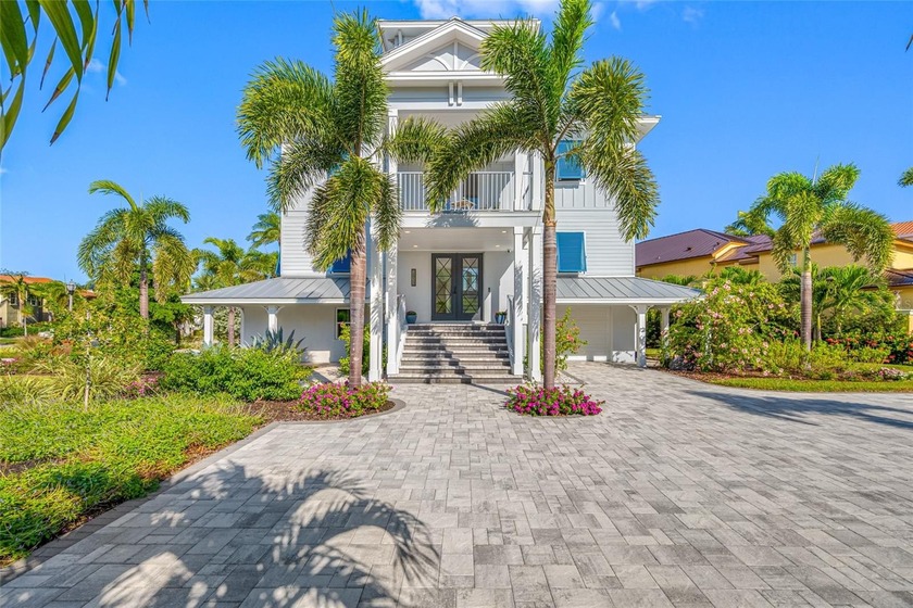 Welcome to this exceptional elevated Key West style 4-bedroom - Beach Home for sale in St. Petersburg, Florida on Beachhouse.com
