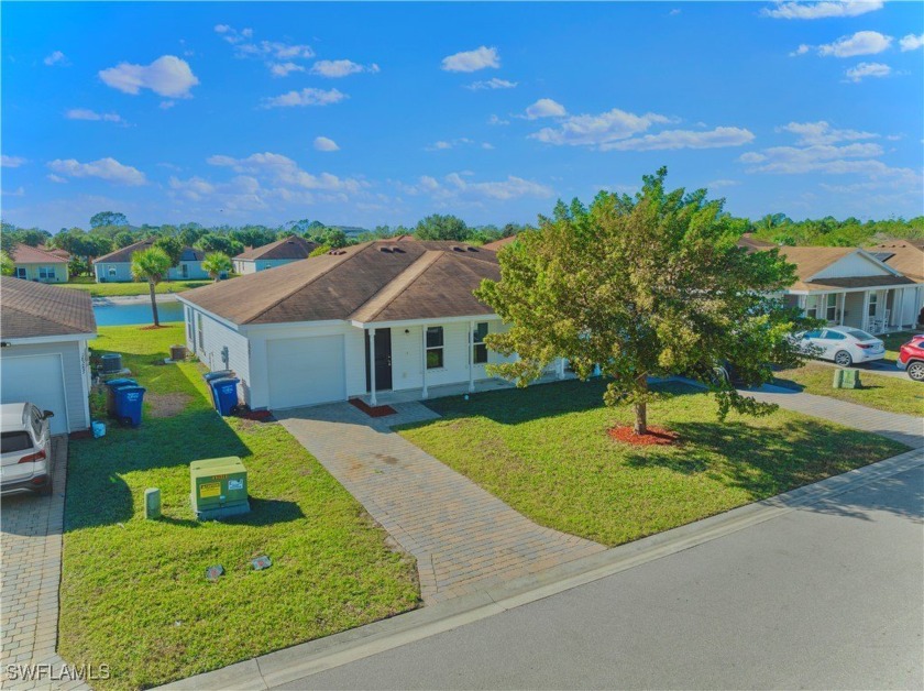 Welcome to this (2019) NEWER construction 3/2 villa nestled away - Beach Home for sale in Lehigh Acres, Florida on Beachhouse.com