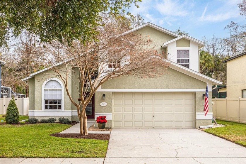 Nestled in the serene community of Brookers Landing, this - Beach Home for sale in Palm Harbor, Florida on Beachhouse.com