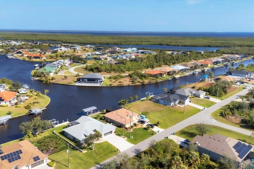 Discover this charming 3 bedroom, 2.5 bathroom waterfront home - Beach Home for sale in Port Charlotte, Florida on Beachhouse.com