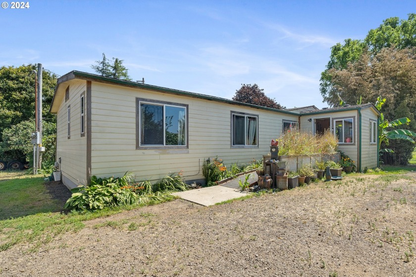 MOTIVATED SELLER! 2 Acre Riverfront 3-bed, 2-Bath Home on the - Beach Home for sale in Tillamook, Oregon on Beachhouse.com