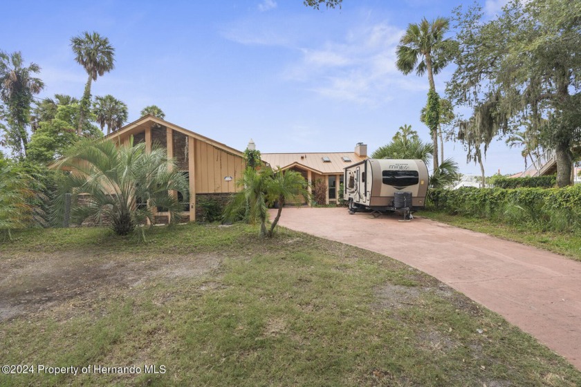 Welcome to your dream home on the Cotee river! This stunning - Beach Home for sale in Port Richey, Florida on Beachhouse.com