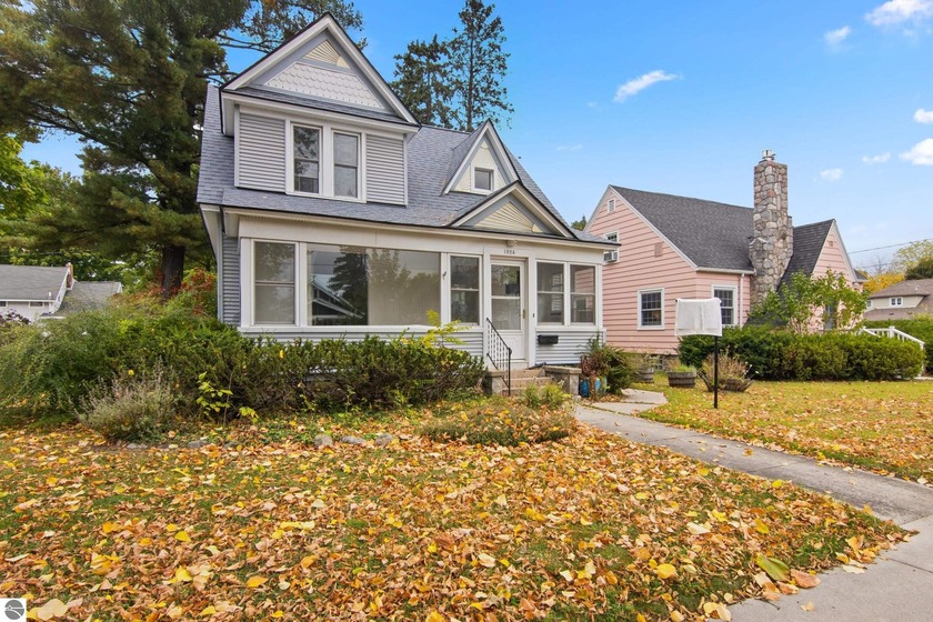 Welcome to 1024 W. Front Street, a beautifully updated four - Beach Home for sale in Traverse City, Michigan on Beachhouse.com