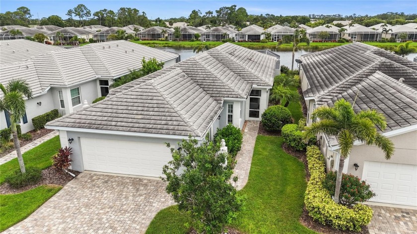 Private Pool, Lake View, and Maintenance-Free. Relax, Unwind - Beach Home for sale in Venice, Florida on Beachhouse.com