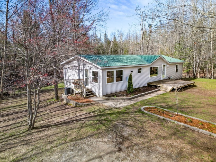 Welcome to 5538 Powers Road in Alanson--a centrally located - Beach Home for sale in Alanson, Michigan on Beachhouse.com