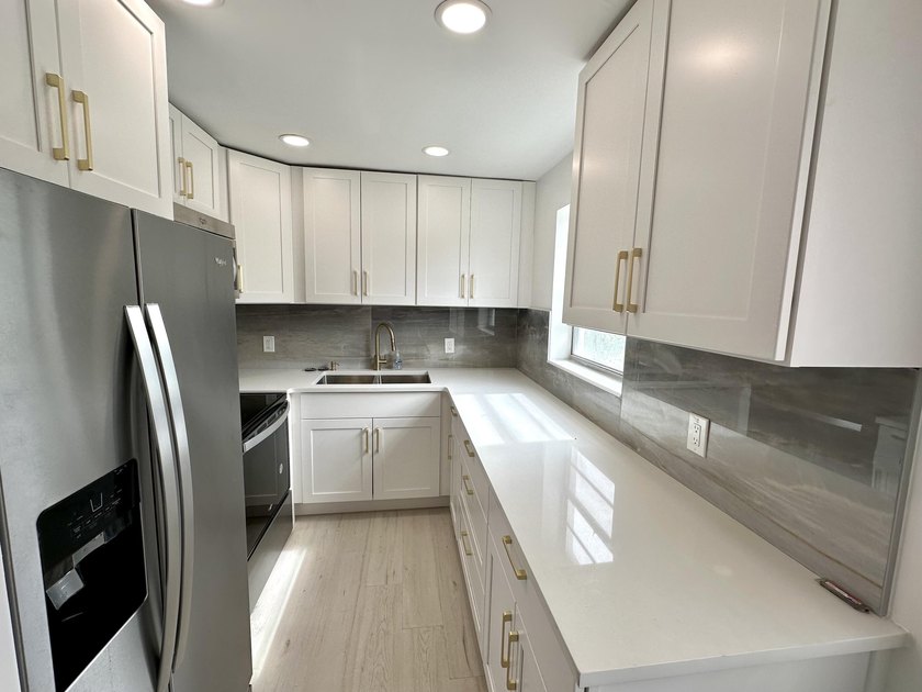 Spectacular & Move-in Ready First floor corner unit in 55+ - Beach Condo for sale in West Palm Beach, Florida on Beachhouse.com