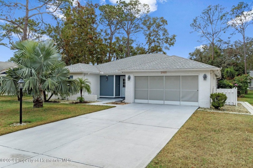 Check out the new paint and don't miss the opportunity to own a - Beach Home for sale in Spring Hill, Florida on Beachhouse.com