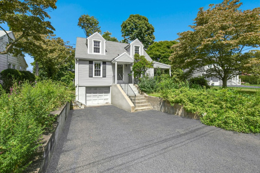 Lovely Sasco Cape with Traditional Floor Plan sits on Sunny .22 - Beach Home for sale in Fairfield, Connecticut on Beachhouse.com